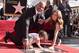 HOLLYWOOD, CA - DECEMBER 13: Actor Dwayne Johnson, Jasmine Johnson and singer Lauren Hashian attend a ceremony honoring Dwayne Johnson with the 2,624th star on the Hollywood Walk of Fame on December 13, 2017 in Hollywood, California. (Photo by Alberto E. Rodriguez/Getty Images)