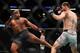 ANAHEIM, CALIFORNIA - AUGUST 17: Daniel Cormier kicks Stipe Miocic in the first round during their UFC Heavyweight Title Bout at UFC 241 at Honda Center on August 17, 2019 in Anaheim, California. (Photo by Joe Scarnici/Getty Images)