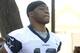 FILE - In this July 27, 2019, file photo, Dallas Cowboys wide receiver Amari Cooper jogs onto the field at the NFL football team's training camp in Oxnard, Calif. Dak Prescott pretends he can’t hear the question when the subject turns to a new contract for the star quarterback of the Dallas Cowboys, while receiver Amari Cooper steadfastly says he simply doesn’t think about what might be happening in his negotiations. Both reported to training camp on time as they prepare for the final year of their respective deals. (AP Photo/Michael Owen Baker, File)
