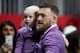 ATLANTA, GEORGIA - FEBRUARY 03: Conor McGregor and Conor McGregor Jr. attend Super Bowl LIII between the New England Patriots and the Los Angeles Rams at Mercedes-Benz Stadium on February 03, 2019 in Atlanta, Georgia. (Photo by Al Bello/Getty Images)