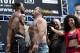 Heavyweight boxers Anthony Joshua, left, and Andy Ruiz Jr. face off during a weigh-in at Madison Square Garden, Friday, May 31, 2019, before their title bout Saturday in New York. (AP Photo/Craig Ruttle)