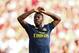 LIVERPOOL, ENGLAND - AUGUST 24: Nicolas Pepe of Arsenal reacts during the Premier League match between Liverpool FC and Arsenal FC at Anfield on August 24, 2019 in Liverpool, United Kingdom. (Photo by Robbie Jay Barratt - AMA/Getty Images)