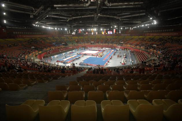 Spectators' seats lie poorly during a gymnastics event in Indira Gandhi Sports Complex in New Delhi, India, Tuesday, Oct. 5, 2010. The empty stadiums that marred the first day of competition at the crisis-hit Commonwealth Games may be filled by children and the underprivileged if attendance doesn't improve. (AP Photo/Anupam Nath)
