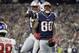 New England Patriots wide receiver Demaryius Thomas (88) celebrates his touchdown catch with Jakobi Meyers, left, in the first half of an NFL preseason football game against the New York Giants, Thursday, Aug. 29, 2019, in Foxborough, Mass. (AP Photo/Steven Senne)