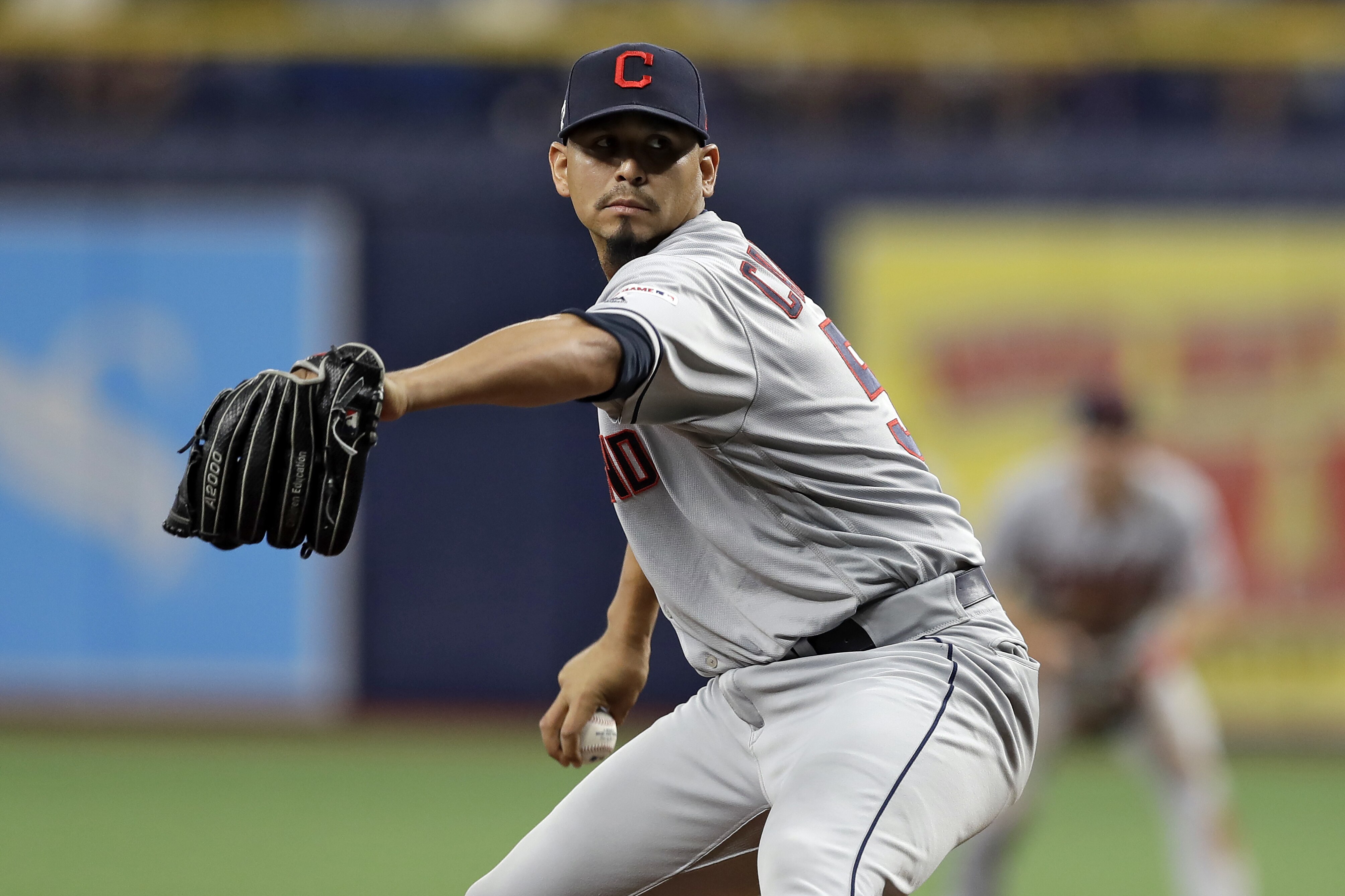 Cleveland Indians pitcher Carlos Carrasco delivers to the Tampa Bay Rays during the seventh inning of a baseball game Sunday, Sept. 1, 2019, in St. Petersburg, Fla. Carrasco is making his first appearance since May, when he was diagnosed with leukemia. (AP Photo/Chris O'Meara)