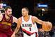 CLEVELAND, OH - JANUARY 2: Kevin Love #0 of the Cleveland Cavaliers tries to stop CJ McCollum #3 of the Portland Trail Blazers during the second half at Quicken Loans Arena on January 2, 2018 in Cleveland, Ohio. The Cavaliers defeated the Trail Blazers 127-110. NOTE TO USER: User expressly acknowledges and agrees that, by downloading and or using this photograph, User is consenting to the terms and conditions of the Getty Images License Agreement. (Photo by Jason Miller/Getty Images)