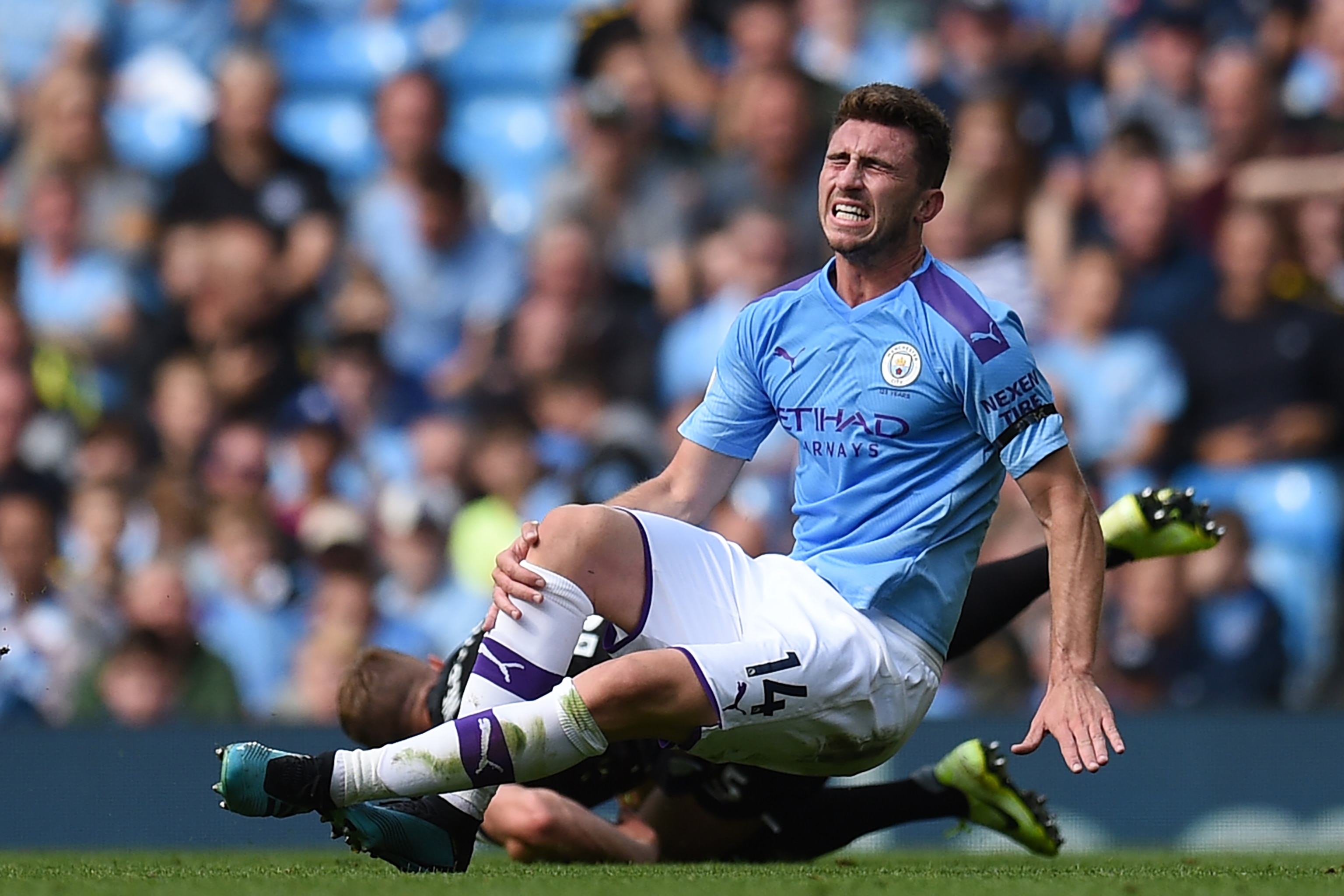 Laporte Going down after sustaining a knee injury Vs Brighton on August 31 2019