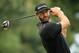 MEDINAH, ILLINOIS - AUGUST 17: Dustin Johnson of the United States plays his shot from the fourth tee during the third round of the BMW Championship at Medinah Country Club No. 3 on August 17, 2019 in Medinah, Illinois. (Photo by Andrew Redington/Getty Images)