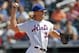 New York Mets starting pitcher Noah Syndergaard (34) winds up during the first inning of a baseball game against the Philadelphia Phillies, Sunday, Sept. 8, 2019, in New York. (AP Photo/Kathy Willens)