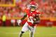 KANSAS CITY, MO - AUGUST 24: Tyreek Hill #10 of the Kansas City Chiefs runs for a 12-yard gain in preseason action against the San Francisco 49ers at Arrowhead Stadium on August 24, 2019 in Kansas City, Missouri. (Photo by David Eulitt/Getty Images)