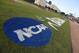 The NCAA logo is painted alongside the visitor dugout at Olsen Field before the start of a NCAA college baseball super regional tournament game between TCU and Texas A&M, Friday, June 10, 2016, in College Station, Texas. TCU won game one of the series 8-2. (AP Photo/Sam Craft)