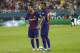 Barcelona's Lionel Messi, left, and Neymar, right, stand on the field during a break in the action during the first half of an International Champions Cup soccer match against Real Madrid, Saturday, July 29, 2017, in Miami Gardens, Fla. (AP Photo/Lynne Sladky)