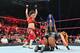 Bayley and Sasha Banks attacking Becky Lynch.
