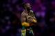 WWE Superstar Kofi Kingston celebrates at the end of the World Wrestling Entertainment (WWE) Super Showdown event in Saudi Arabia's Red Sea port city of Jeddah late on January 7, 2019. (Photo by Amer HILABI / AFP) (Photo credit should read AMER HILABI/AFP/Getty Images)