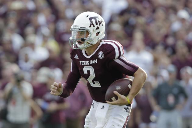 Texas A&M's Johnny Manziel runs against Alabama during the third quarter of an NCAA college football game Saturday, Sept. 14, 2013, in College Station, Texas. (AP Photo/Eric Gay)