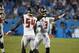 Tampa Bay Buccaneers outside linebacker Lavonte David (54) and quarterback Jameis Winston (3) celebrate following the team's 20-14 win over the Carolina Panthers following an NFL football game in Charlotte, N.C., Friday, Sept. 13, 2019. (AP Photo/Brian Blanco)