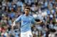 Manchester City's Aymeric Laporte runs for the ball during the English Premier League soccer match between Manchester City and Tottenham Hotspur at Etihad stadium in Manchester, England, Saturday, Aug. 17, 2019. (AP Photo/Rui Vieira)