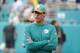 Miami Dolphins head coach Adam Gase watches the team warm up, before an NFL football game against the New England Patriots, Sunday, Dec. 9, 2018, in Miami Gardens, Fla. (AP Photo/Wilfredo Lee)
