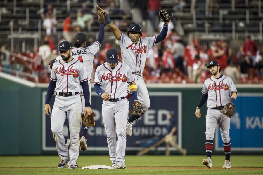 Braves become 1st MLB team to clinch playoff spot as Acuña and