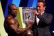 MELBOURNE, AUSTRALIA - MARCH 17: Arnold Schwarzenegger presents winner Brandon Curry with his trophy during the 2017 Arnold Classic at The Melbourne Convention and Exhibition Centre on March 17, 2017 in Melbourne, Australia. (Photo by Robert Cianflone/Getty Images)