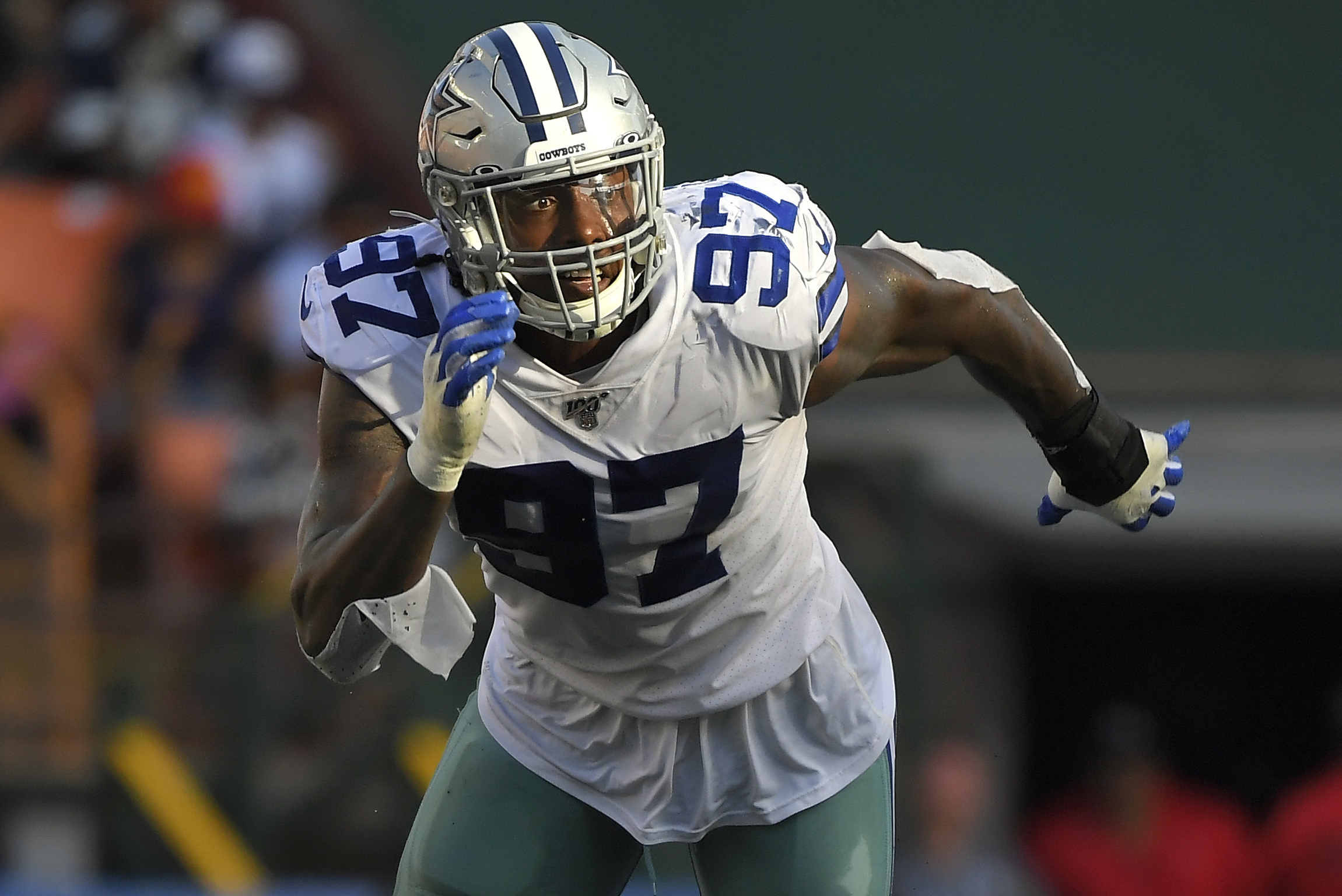 Dallas Cowboys defensive end Taco Charlton (97) walks off the