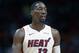 Miami Heat center Bam Adebayo (13) looks on during the first half of an NBA basketball game, Thursday, March 28, 2019, in Miami. The Heat defeated the Mavericks 105-99. (AP Photo/Joel Auerbach)