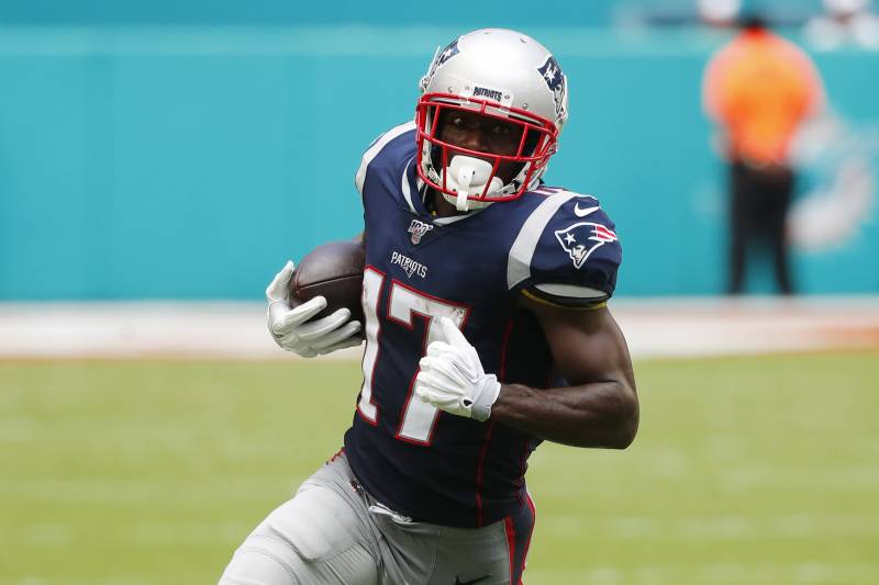 New England Patriots wide receiver Antonio Brown (17) runs the ball, during the first half at an NFL football game against the Miami Dolphins, Sunday, Sept. 15, 2019, in Miami Gardens, Fla. (AP Photo/Wilfredo Lee)