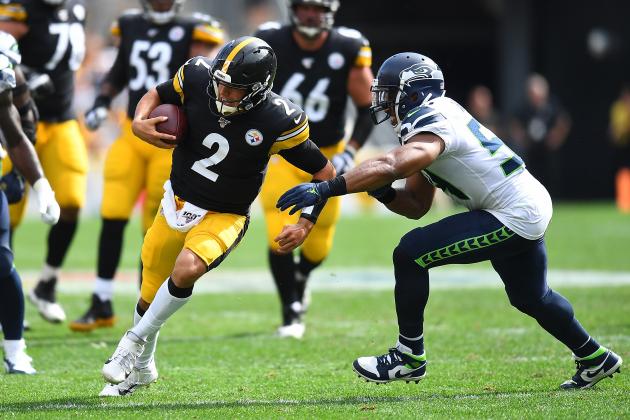 PITTSBURGH, PA - SEPTEMBER 15:  Mason Rudolph #2 of the Pittsburgh Steelers rushes for a first down in front of Bobby Wagner #54 of the Seattle Seahawks during the fourth quarter at Heinz Field on September 15, 2019 in Pittsburgh, Pennsylvania. Seattle won the game 28-26. (Photo by Joe Sargent/Getty Images)