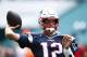 New England Patriots quarterback Tom Brady (12) warms up before an NFL football game against the Miami Dolphins, Sunday, Sept. 15, 2019, in Miami Gardens, Fla. (AP Photo/Brynn Anderson)