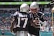 New England Patriots quarterback Tom Brady (12) wide receiver Antonio Brown (17) after Brown scored a touchdown, during the first half at an NFL football game against the Miami Dolphins, Sunday, Sept. 15, 2019, in Miami Gardens, Fla. (AP Photo/Lynne Sladky)