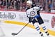MONTREAL, QC - FEBRUARY 07: Dustin Byfuglien #33 of the Winnipeg Jets skates the puck against the Montreal Canadiens during the NHL game at the Bell Centre on February 7, 2019 in Montreal, Quebec, Canada. The Montreal Canadiens defeated the Winnipeg Jets 5-2. (Photo by Minas Panagiotakis/Getty Images)