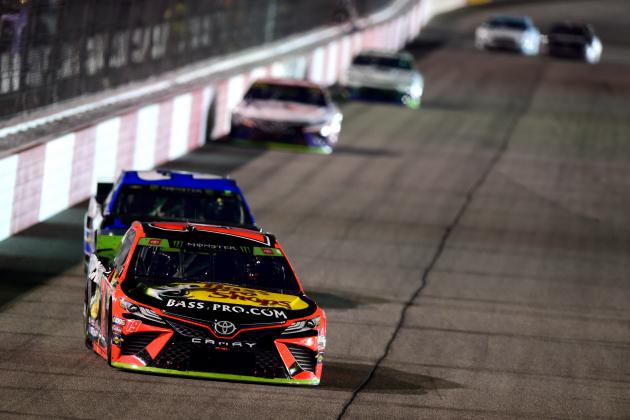 RICHMOND, VIRGINIA - SEPTEMBER 21: Martin Truex Jr., driver of the #19 Bass Pro Shops Toyota, leads a pack of cars during the Monster Energy NASCAR Cup Series Federated Auto Parts 400 at Richmond Raceway on September 21, 2019 in Richmond, Virginia. (Photo by Jared C. Tilton/Getty Images)