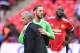 Manchester United's Portuguese manager Jose Mourinho (L) reacts with Manchester United's Spanish goalkeeper David de Gea (C) after losing the English FA Cup final football match between Chelsea and Manchester United at Wembley stadium in London on May 19, 2018. (Photo by Glyn KIRK / AFP) / NOT FOR MARKETING OR ADVERTISING USE / RESTRICTED TO EDITORIAL USE (Photo credit should read GLYN KIRK/AFP/Getty Images)