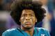 Jacksonville Jaguars cornerback Jalen Ramsey stands on the sideline during the opening ceremonies of an NFL football game between the Jacksonville Jaguars and the Tennessee Titans, Thursday, Sept. 19, 2019, in Jacksonville, Fla. (AP Photo/Stephen B. Morton)