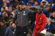 Liverpool's German manager Jurgen Klopp (L) gestures to Liverpool's Senegalese striker Sadio Mane (R) on the pitch after the English Premier League football match between Chelsea and Liverpool at Stamford Bridge in London on September 22, 2019. - Liverpool won the game 2-1. (Photo by OLLY GREENWOOD / AFP) / RESTRICTED TO EDITORIAL USE. No use with unauthorized audio, video, data, fixture lists, club/league logos or 'live' services. Online in-match use limited to 120 images. An additional 40 images may be used in extra time. No video emulation. Social media in-match use limited to 120 images. An additional 40 images may be used in extra time. No use in betting publications, games or single club/league/player publications. / (Photo credit should read OLLY GREENWOOD/AFP/Getty Images)