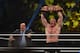 Brock Lesnar celebrates, with his manager Paul Heyman, after winning the WWE Universal Championship match as part of as part of the World Wrestling Entertainment (WWE) Crown Jewel pay-per-view at the King Saud University Stadium in Riyadh on November 2, 2018. (Photo by Fayez Nureldine / AFP) (Photo credit should read FAYEZ NURELDINE/AFP/Getty Images)