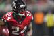 Atlanta Falcons running back Devonta Freeman (24) runs against the Philadelphia Eagles during the second half of an NFL football game, Sunday, Sept. 15, 2019, in Atlanta. (AP Photo/John Amis)