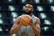 Boston Celtics' Jaylen Brown warms up before Game 3 of a second round NBA basketball playoff series against the Milwaukee Bucks in Boston, Friday, May 3, 2019. (AP Photo/Michael Dwyer)