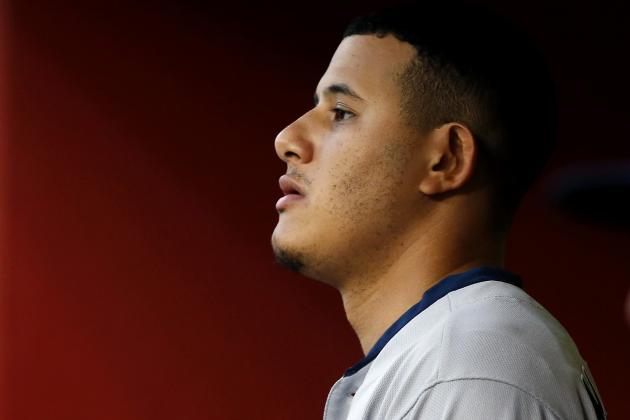 San Diego Padres' Manny Machado looks out from the dugout during a baseball game against the Arizona Diamondbacks, Saturday, Sept. 28, 2019, in Phoenix. (AP Photo/Ralph Freso)