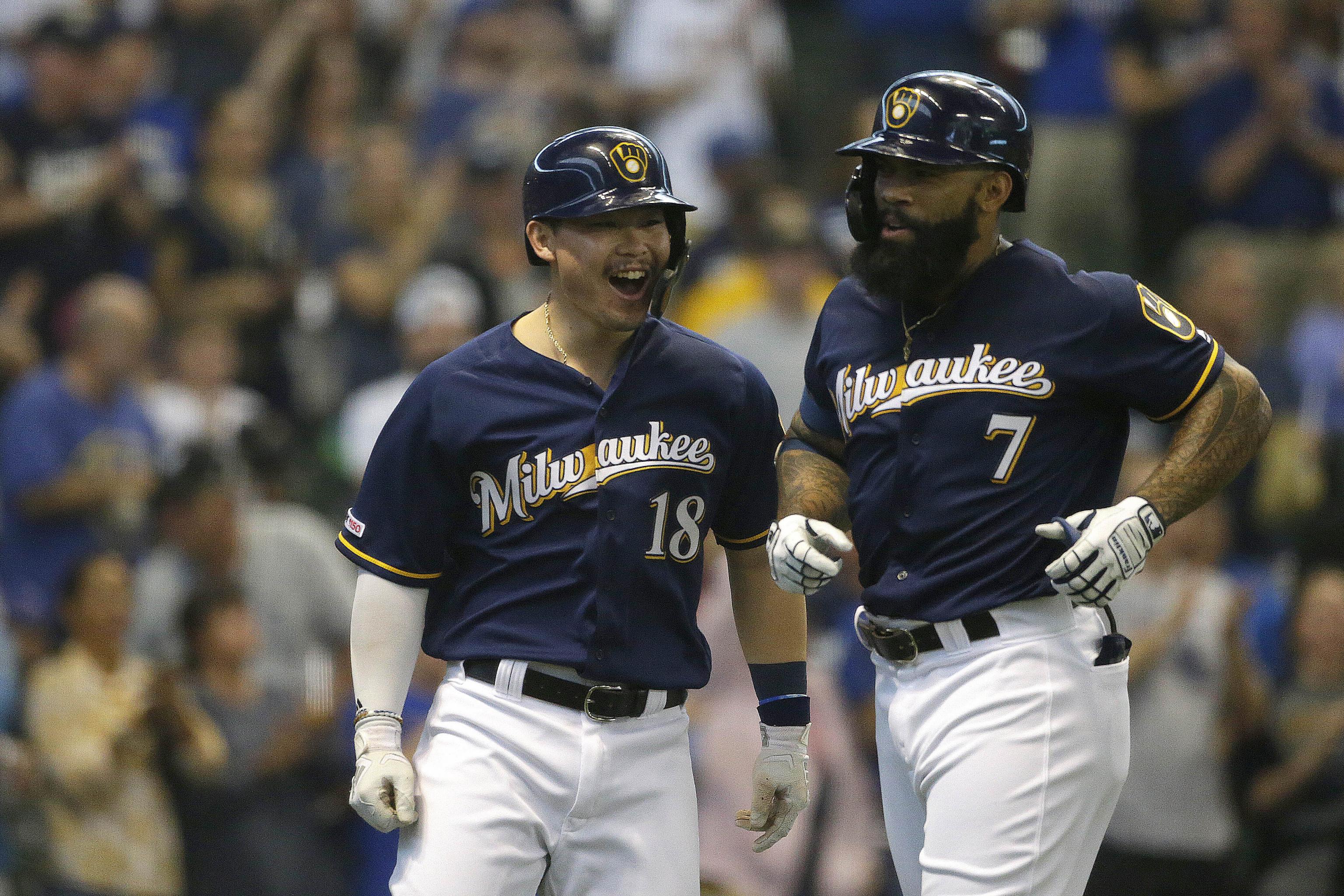 Mike Moustakas scores Christian Yelich in 10th, Brewers top Rockies in NLDS  opener