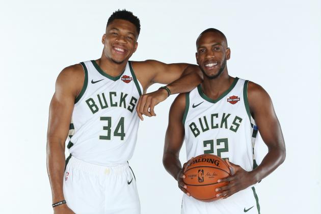MILWAUKEE, WI - SEPTEMBER 30: Giannis Antetokounmpo #34 and Khris Middleton #22 of the Milwaukee Bucks pose for a portrait during Media Day at Fiserv Forum on September 30, 2019 in Milwaukee, Wisconsin. NOTE TO USER: User expressly acknowledges and agrees that, by downloading and/or using this photograph, user is consenting to the terms and conditions of the Getty Images License Agreement. Mandatory Copyright Notice: Copyright 2019 NBAE (Photo by Gary Dineen/NBAE via Getty Images)