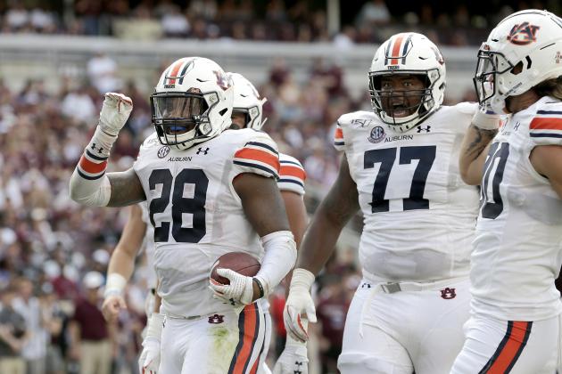 Auburn running back JaTarvious Whitlow (28) reacts after scoring a touchdown against Texas A&M during the second half of an NCAA college football game, Saturday, Sept. 21, 2019, in College Station, Texas. (AP Photo/Sam Craft)