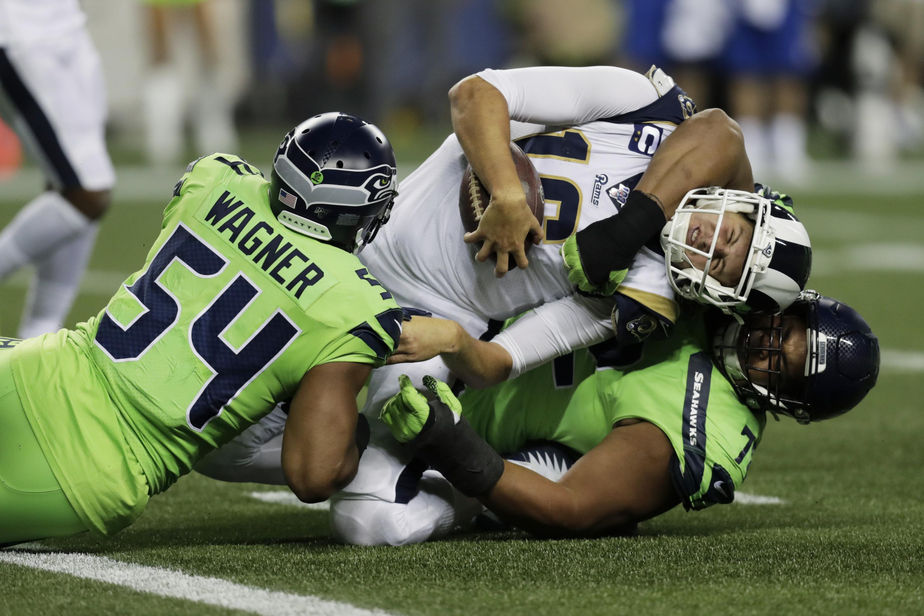 Jared Goff gets knocked out in Rams' loss to Seahawks, 24-3 - Chicago  Tribune