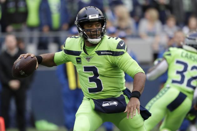 Seattle Seahawks quarterback Russell Wilson drops back to pass against the Los Angeles Rams during the first half of an NFL football game Thursday, Oct. 3, 2019, in Seattle. (AP Photo/Elaine Thompson)