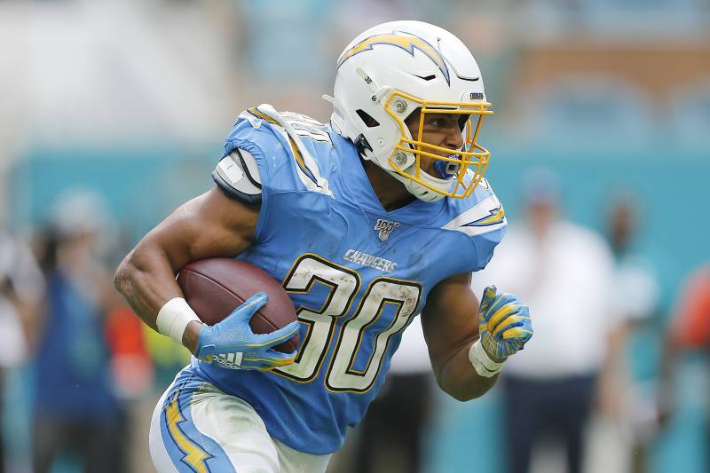 MIAMI, FLORIDA - SEPTEMBER 29: Austin Ekeler #30 of the Los Angeles Chargers runs with the ball against the Miami Dolphins during the third quarter at Hard Rock Stadium on September 29, 2019 in Miami, Florida. (Photo by Michael Reaves/Getty Images)