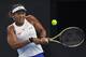Naomi Osaka of Japan hits a return during the women's singles final against Ashleigh Barty of Australia at the China Open tennis tournament in Beijing on October 6, 2019. (Photo by NOEL CELIS / AFP) (Photo by NOEL CELIS/AFP via Getty Images)