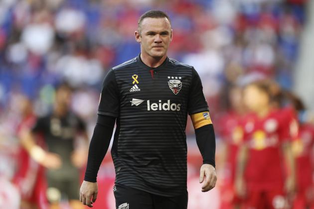 D.C. United forward Wayne Rooney (9) walks over to take a corner kick during the first half of an MLS soccer match against the New York Red Bulls, Sunday, Sept. 29, 2019, in Harrison, N.J. The match ended in a 0-0 draw. (AP Photo/Steve Luciano)