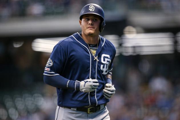 MILWAUKEE, WISCONSIN - SEPTEMBER 17:  Manny Machado #13 of the San Diego Padres jogs across the field in the sixth inning against the Milwaukee Brewers at Miller Park on September 17, 2019 in Milwaukee, Wisconsin. (Photo by Dylan Buell/Getty Images)