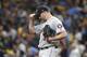 Houston Astros' Justin Verlander adjusts his cap while pitching in the third inning of Game 4 of a baseball American League Division Series against the Tampa Bay Rays, Tuesday, Oct. 8, 2019, in St. Petersburg, Fla. (AP Photo/Scott Audette)