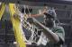 Michigan State forward Draymond Green cuts the net after his team's 68-64 win over Ohio State in an NCAA college basketball game in the final of the Big Ten men's tournament in Indianapolis, Sunday, March 11, 2012. (AP Photo/Michael Conroy)